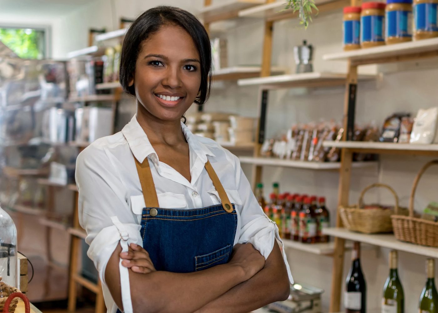 A small business owner standing in her shop