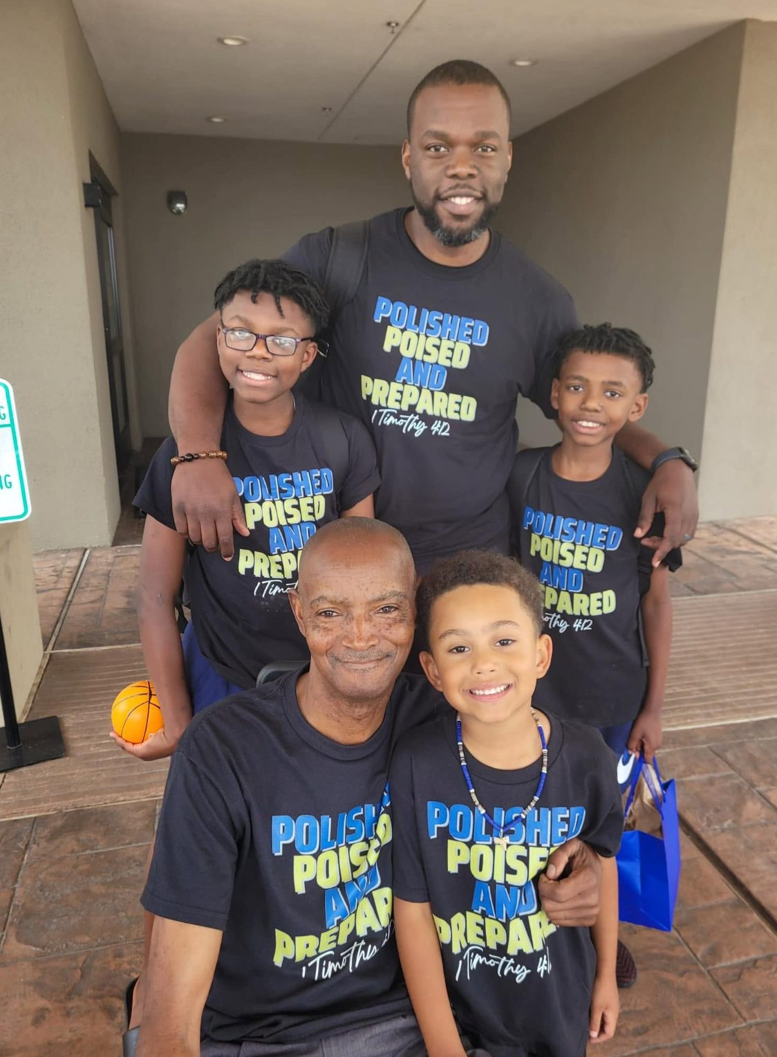 Three generations of family wearing matching Polished, Poised, and Prepared shirts